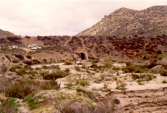 Downstream view of railroad-crossing embankment downstream of Joe Bill Canyon